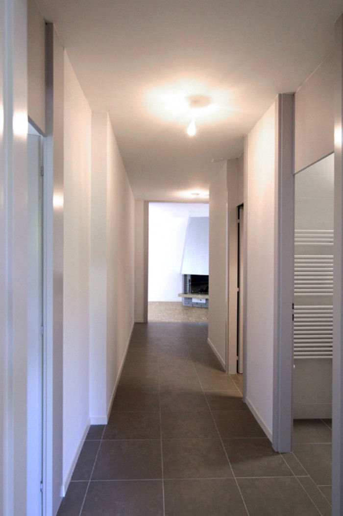 Caudoz Pully rénovation transformation d'un appartement PPE couloir distribution